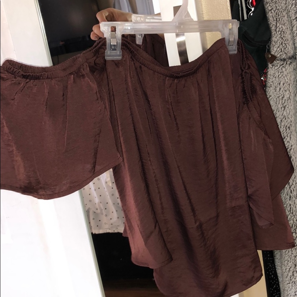 Off the shoulder has elastic around arms &chest